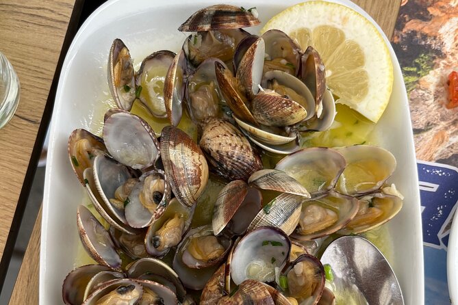 Albufeira Food Experience: Land & Sea Tapas w/ Wines - Two Portuguese wines are part of the value