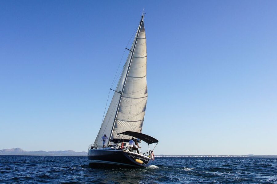 Alcudia: Sailing Yacht Excursion with Wine & Tapas - Take the wheel or settle in with a drink