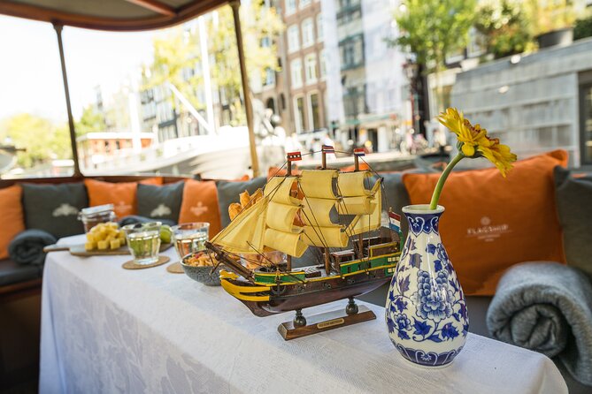 Amsterdam Canal Cruise with Cheese and Wine - The Flower Market and canal museums