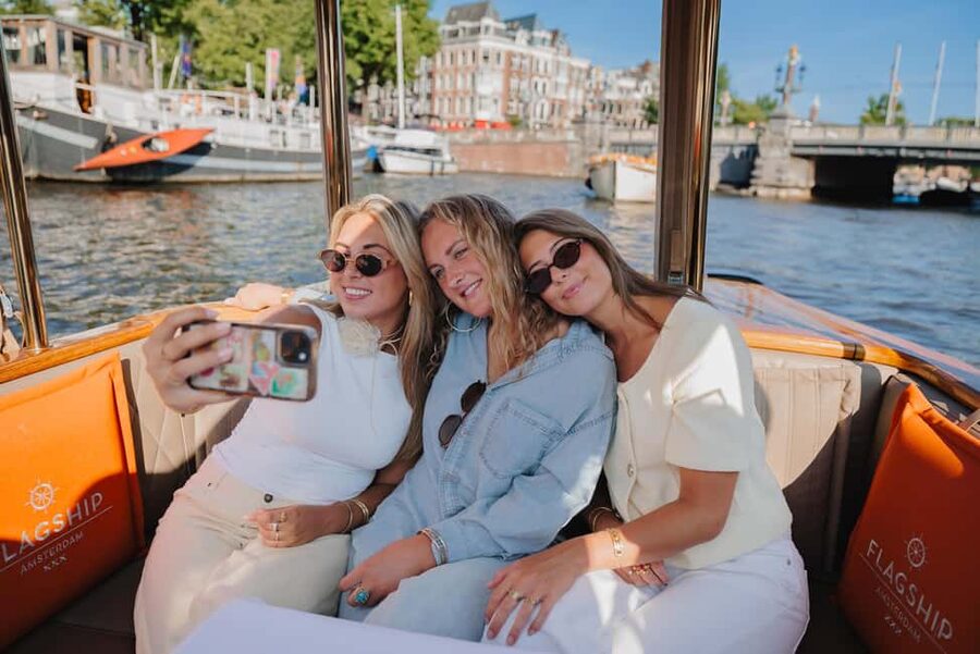 Amsterdam: Classic Saloon Boat Cruise with Cheese & Wine - Stopera, Groenburgwal, and the dancing houses