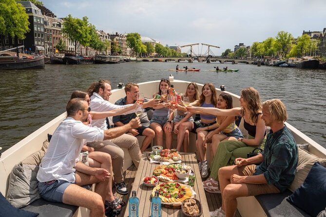 Amsterdam: Evening Candle Light Cruise With Wine & Cheese - The Red Light District and Oude Kerk