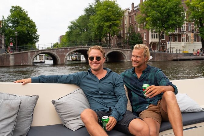 Amsterdam: Evening Candle Light Cruise With Wine & Cheese - Magere Brug after dark