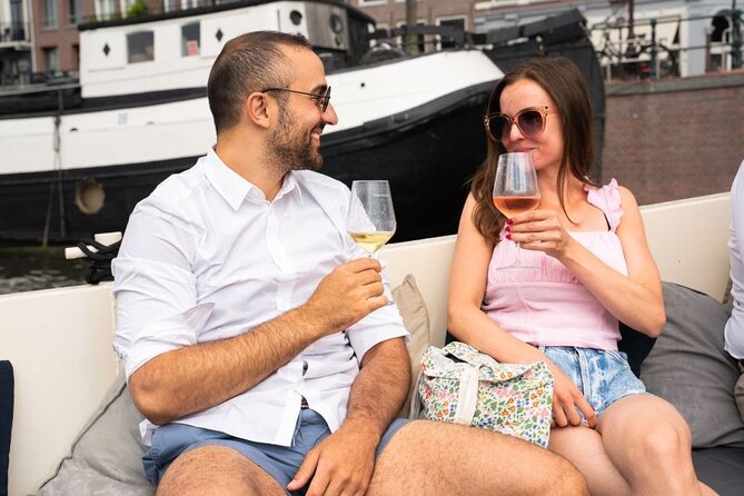 Amsterdam: Evening Candle Light Cruise With Wine & Cheese - Herengracht, Seven Bridges, and Prinsengracht
