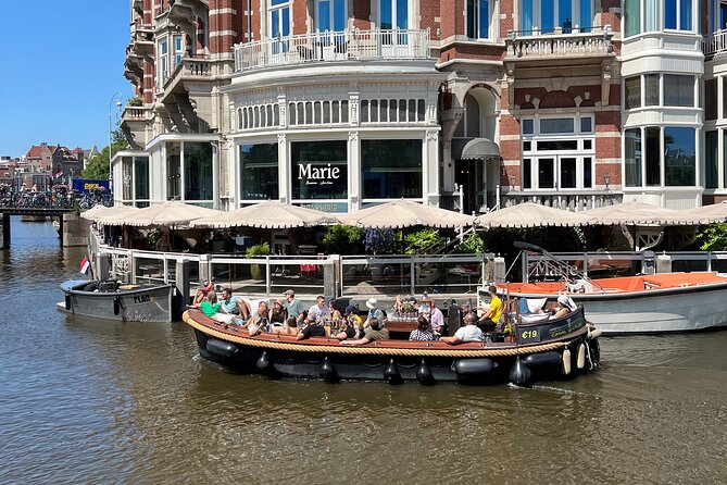 Amsterdam Luxury Boutique Boat tour with Unlimited Beer and Wine - Cancellation and weather details