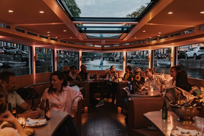 Amsterdam Small-Group Evening Canal Cruise Including Wine, Craft Beer, Cheese - A small boat with a social feel