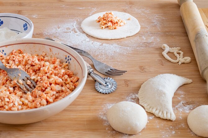 Apulian Cooking Class with Aperitif and Wine in Polignano a Mare - Rolling and shaping the orecchiette