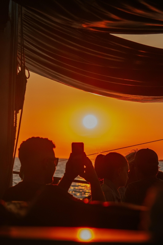 Argostoli: Sunset Cruise with Swim Stops, Dinner, and Wine - From Argostoli harbor to the open Ionian Sea