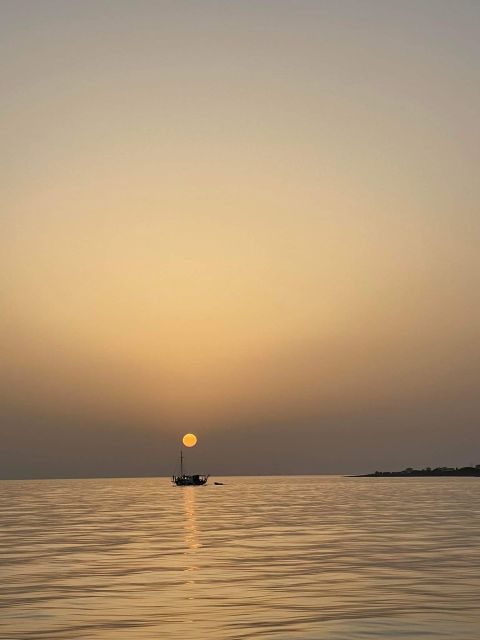 Argostoli: Sunset Cruise with Swim Stops, Dinner, and Wine - Vardiani Islands, the first big swim