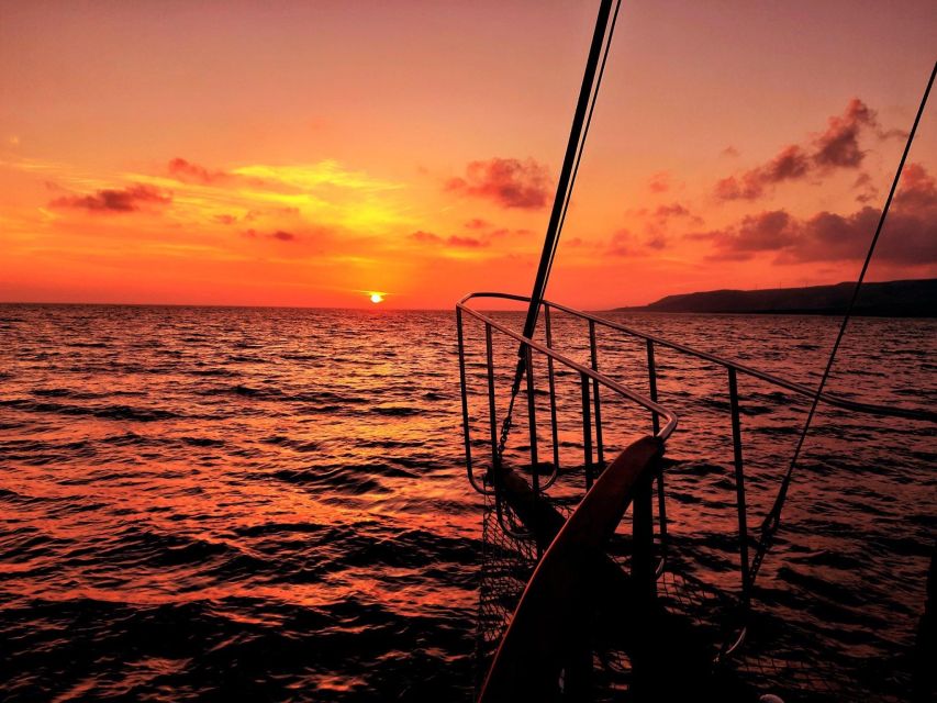 Argostoli: Sunset Cruise with Swim Stops, Dinner, and Wine - A homemade dinner as the sun goes down