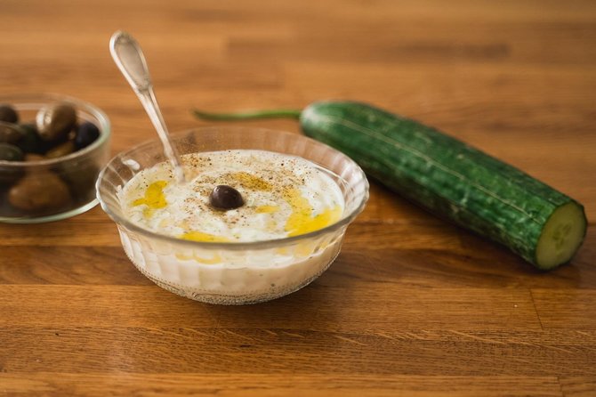 Athens: Classic Cooking Class with Market Visit and Wine - A family-style meal with wine