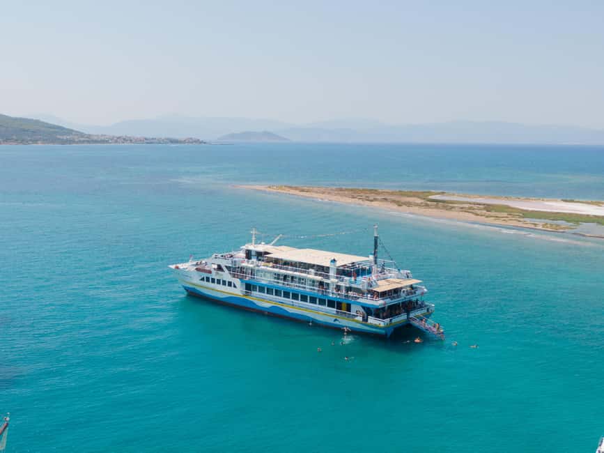 Athens: Swimming Cruise with Lunch, Wine & Live DJ on Board - Metopi: a 40-minute swim in open water
