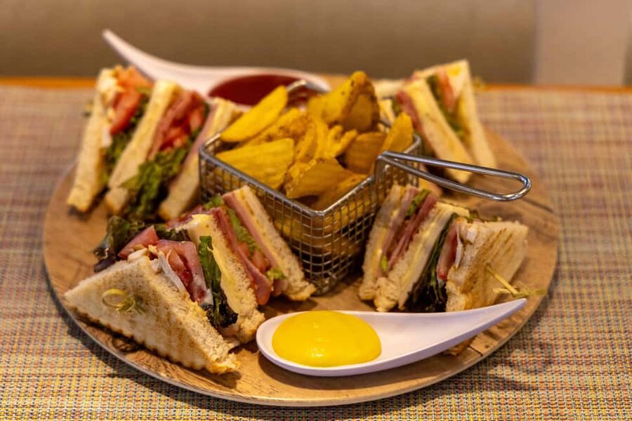Athens: Swimming Cruise with Lunch, Wine & Live DJ on Board - Aegina: island atmosphere and pistachio shopping
