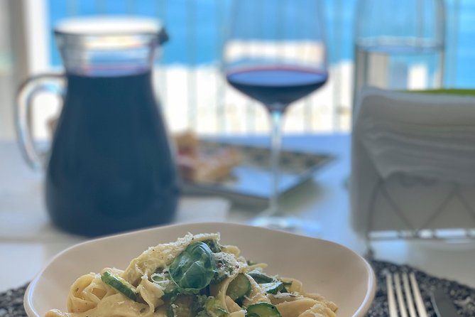 Authentic Cooking with Locals: Meal, Wine & Scenic Views - Timing, weather, and cancellation details