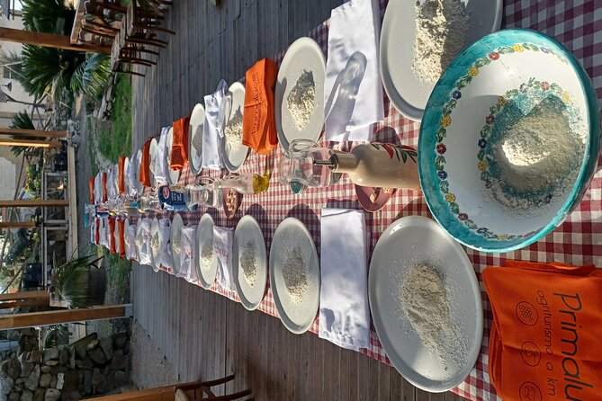 Authentic Farm Tour with Pizza, Cheese, Wine & Limoncello Tasting - Making pizza with help from Anna