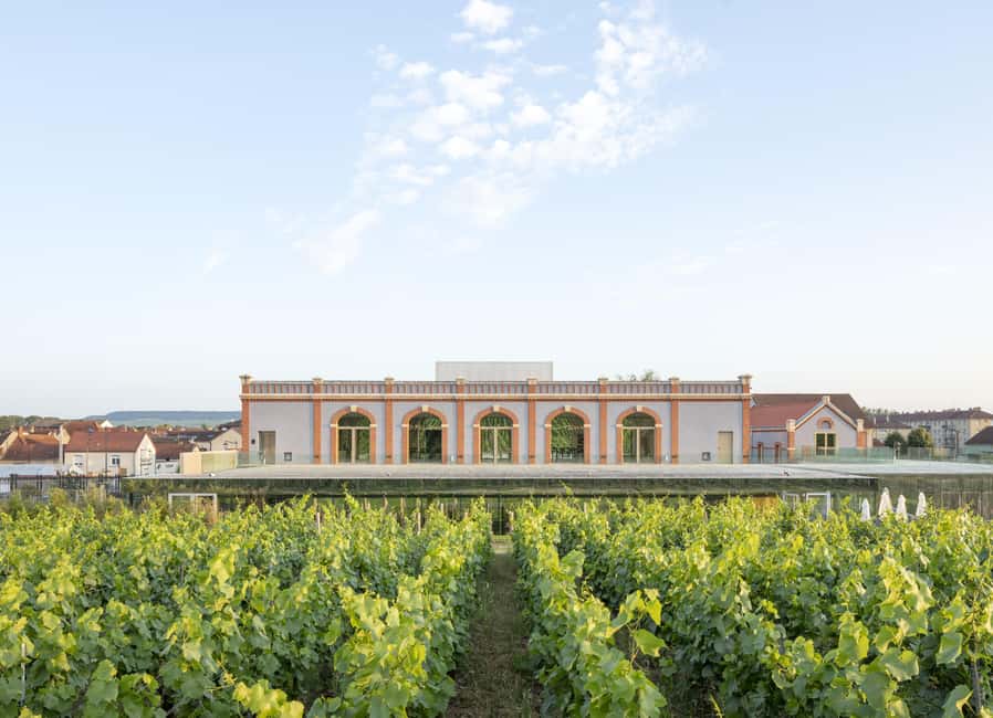 Aÿ-Champagne: Pressoria Champagne Museum with Tasting - Arriving in Aÿ-Champagne and finding Pressoria