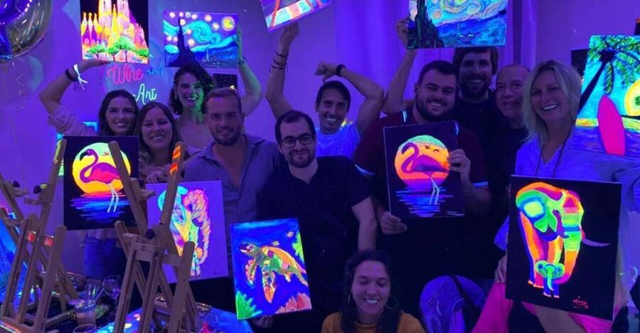 Barcelona: Fluorescent Paint and Wine Workshop - Starting with a blank canvas and a little help