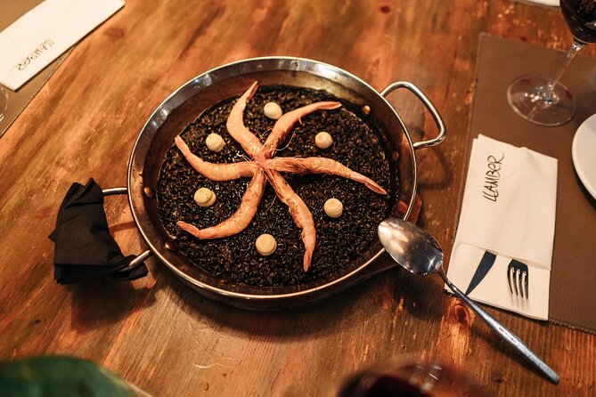 Barcelona: Guided Food Walking Tour with Tapas and Wine - Walking past Roman walls and into El Born