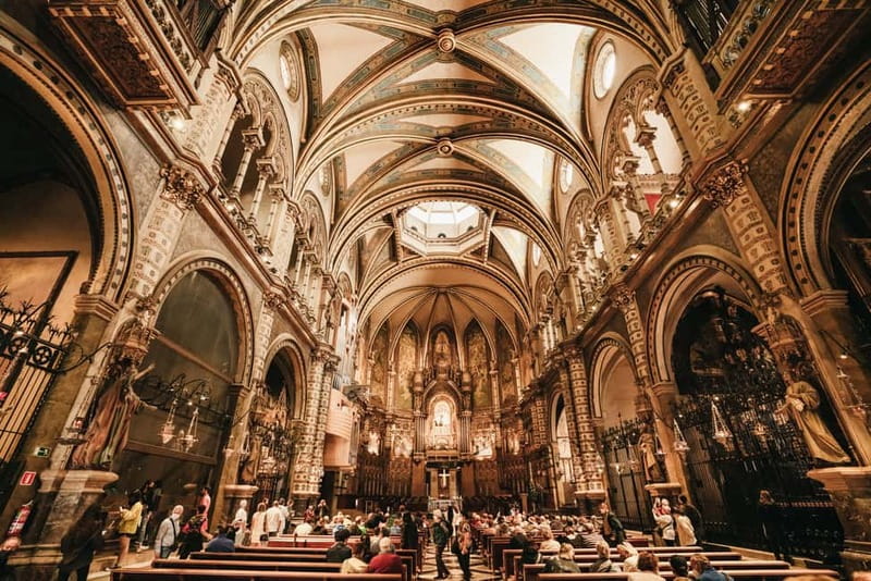 Barcelona: Montserrat, Cogwheel, Black Madonna & Winery Tour - Riding the coach and cogwheel train to Montserrat