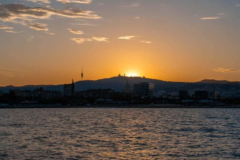 Barcelona: Sunset Catamaran Cruise with Wine and Tapa - Wine, cava, and a Mediterranean tapa