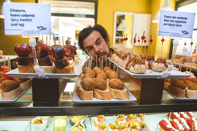 Barcelona Tapas & Wine Private Tour in Traditional Taverns - Stop four: a 1912 bar and Catalan cava