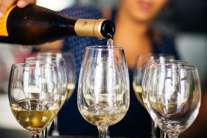 Barcelona With Locals: Wine and Tapas Private Tour - Timing, walking, and the meeting point