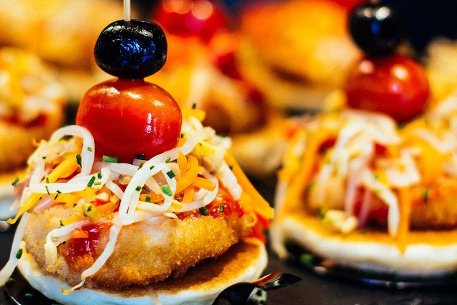 Barcelona With Locals: Wine and Tapas Private Tour - Mercat de Sant Antoni and the start in Eixample Esquerra