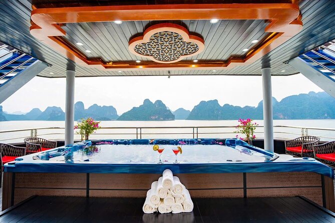 BEST SELLER - Halong 5 Star Day Cruise: Buffet, Wine & Jacuzzi - Titop Island combines a beach stop with a steep view
