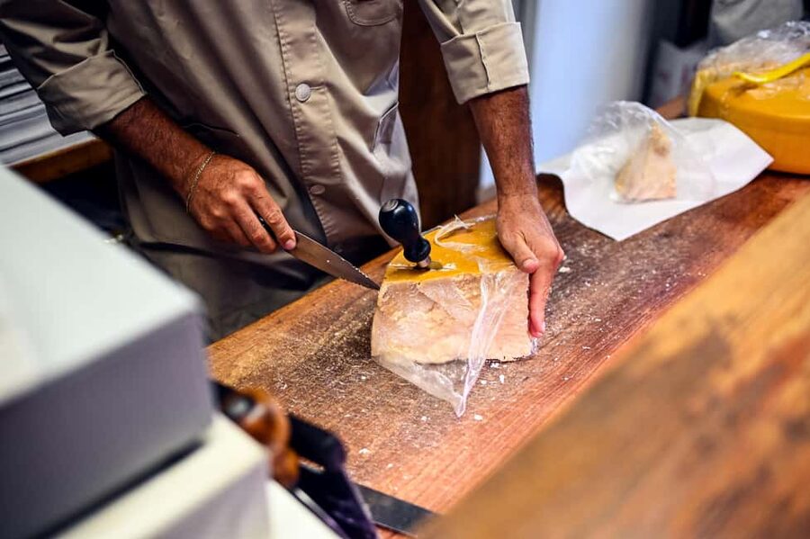 Bologna: Local Food Tour with Authentic Tastings and Wine - Parmigiano Reggiano and balsamic aged for decades