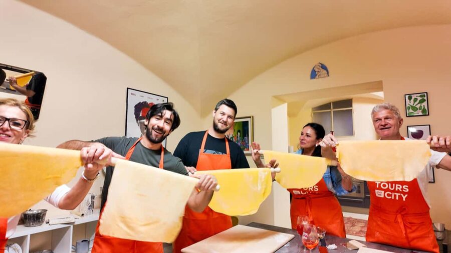 Bologna: Pasta Cooking Class, Ragu, Spritz, Wine & Gelato - Mixing a Casoni Spritz between pasta steps