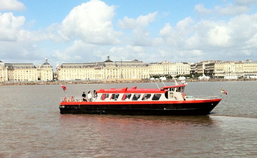 Bordeaux: River Cruise with Commentary, Wine and Canelé - A canelé and a glass of Bordeaux