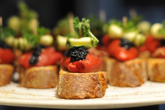 Born to Eat: Gourmet Tapas & Wine Small Group Tour in Old Barcelona - Stop four: Mercat del Born and the city below