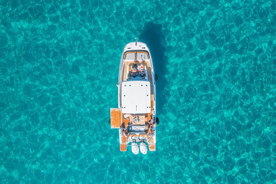 Cagliari: Luxury Motorboat Tour with 3 Swim Stops & Wine - The boat, seating, and comfort
