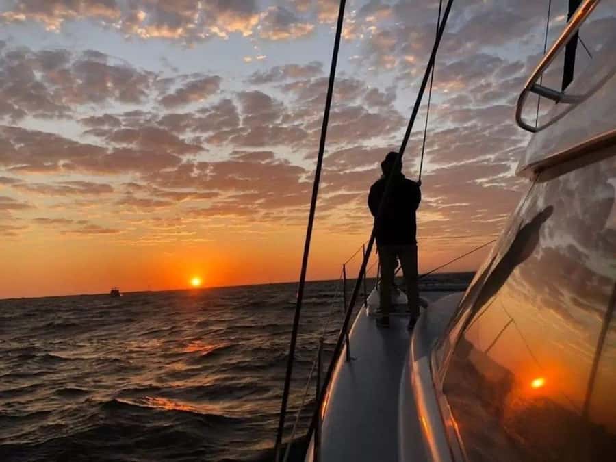 Cape Town: Sunset Champagne Cruise - Two glasses of sparkling wine and the onboard mood