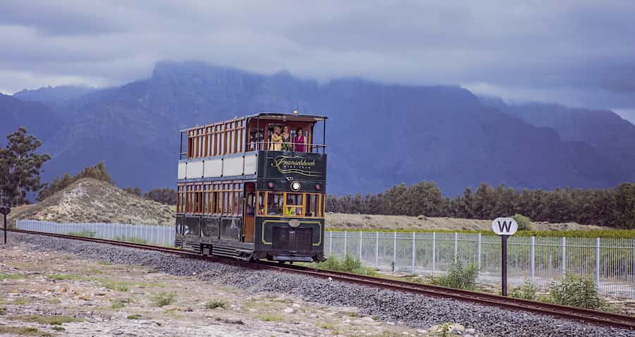 Cape Town: Wine Tram & Winelands Tour with Tastings & Pickup - Stellenbosch brings architecture and Pinotage