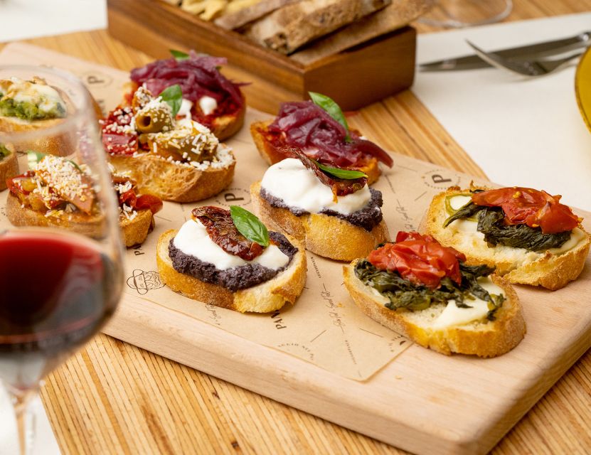 Catania: Volcanic Wine Tasting in a Metropolitan Market - Four glasses, four food pairings