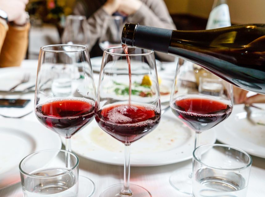 Chania: Wine, Food, and Sunset Tour with 3-Course Dinner - Wine, food, and the secret garden setting
