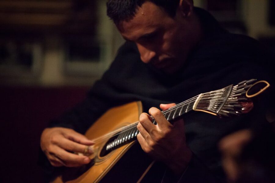 Coimbra: Live Fado Show with Glass of Port Wine - The opening explanation gives the music a place