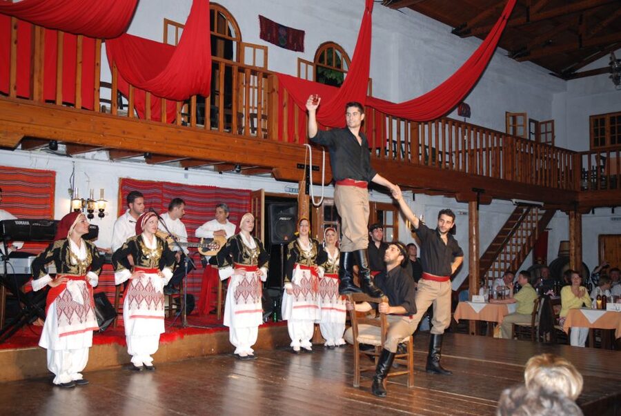 Crete: Traditional Dance Show and Buffet Dinner with Wine - Languages, group comfort, and practical details