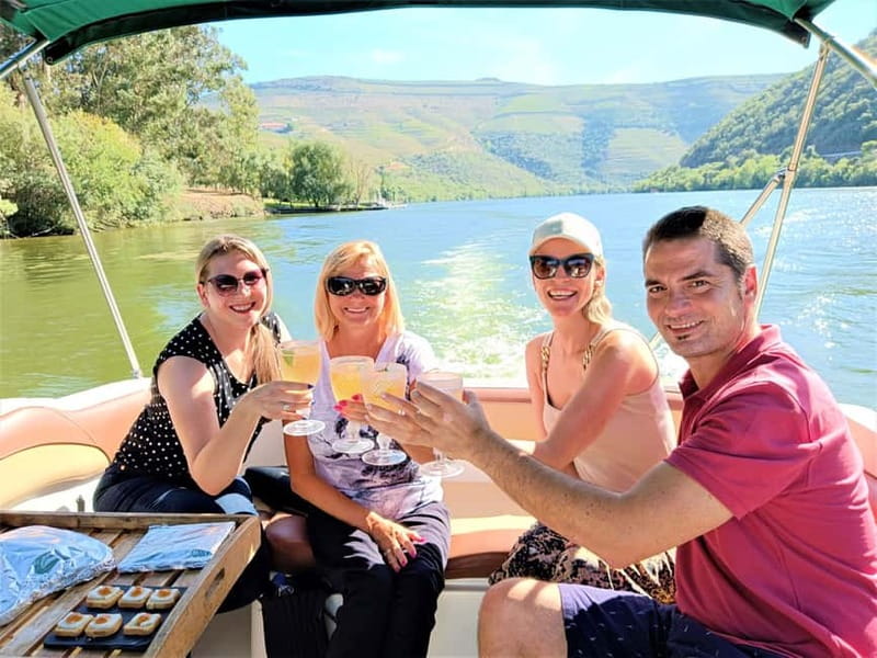 Douro Valley: Winery, Traditional Lunch & Private Boat Trip - A small producer and 11 Douro wines