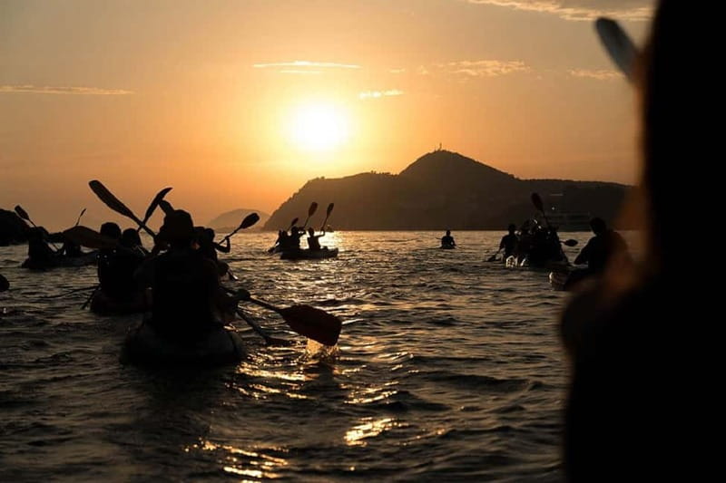 Dubrovnik: Guided Sunset Sea Kayaking Tour with Wine - Paddling beside Dubrovnik’s Old Town walls