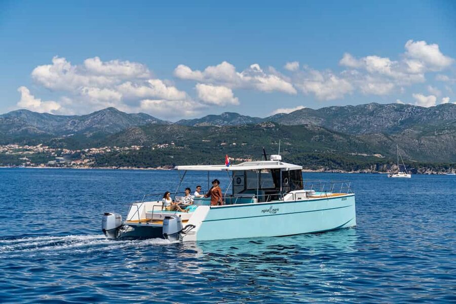 Dubrovnik: Sunset Catamaran Cruise with Sparkling Wine - Leaving the Old Town harbor