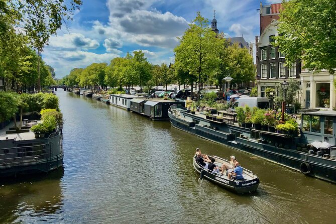 Exclusive Cheese Walk & Dutch Wine Discovery - Passing the Anne Frank House and entering the Jordaan
