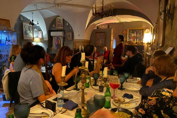 Fado Musical Experience with Portuguese Wine & Appetizers - What the guide adds to the night