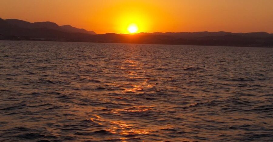 Faliraki: Evening RIB Cruise with Champagne and Sunset Views - The sunset moment, champagne, and fruit