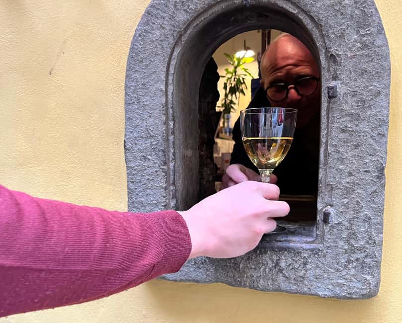 Florence: Food Walking Tour with Local Steak and Tuscan Wine - The old wine window and the Florentine aperitivo