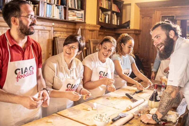 Florence: Pasta & Tiramisu Class with Unlimited Wine - Building ragù and tomato sauce