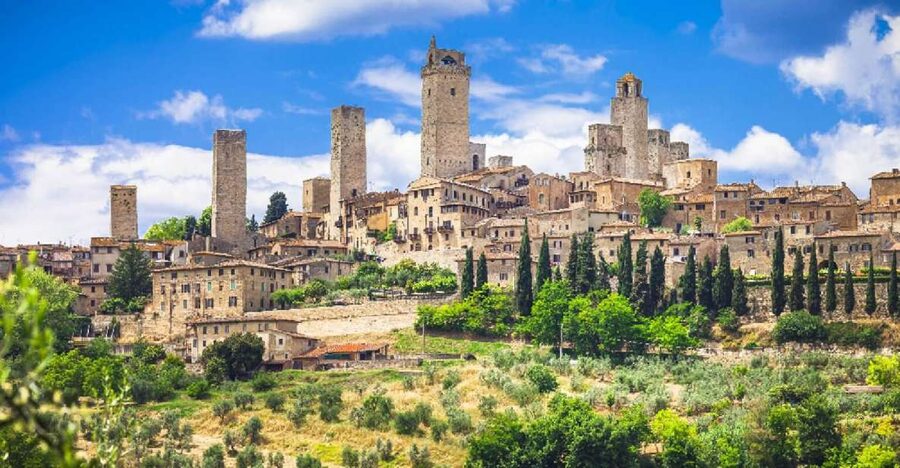 Florence: San Gimignano & Volterra Day Trip with Food & Wine - Starting beneath San Niccolò Tower