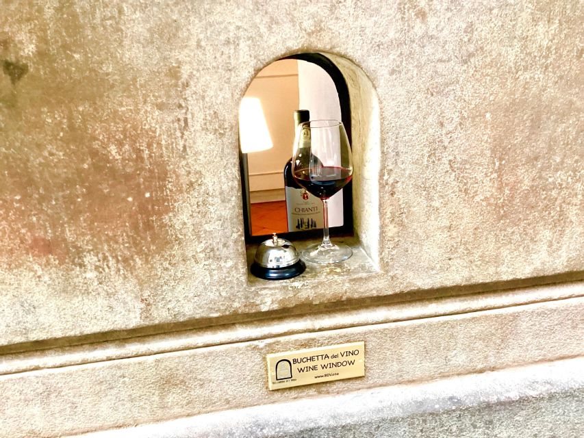 Florence: Wine Windows Walk with Wine Tasting and Appetizers - Piazza della Repubblica and the wine-window stop