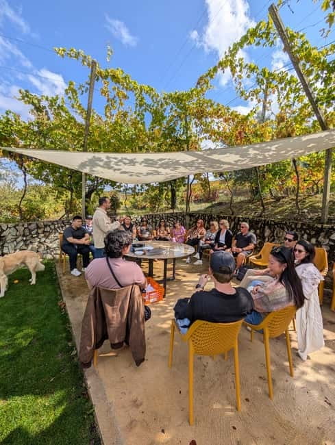 From Porto: 2 Wine Regions, Farm-to-Table Lunch & Boat - The Vintage Port bottle opens with fire