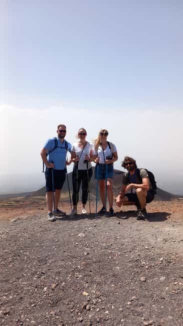 From Siracusa: Etna Tour - Trek, Wine and Food - Entering a lava cave with helmet and poles